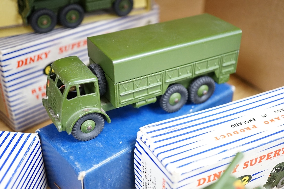Four boxed Dinky Toys military vehicles; Mighty Antar tank transporter (660), Centurion tank (651), Recovery Tractor (661), and 10-ton Army Truck (622). Condition - fair to good, vehicles generally very good, minor wear